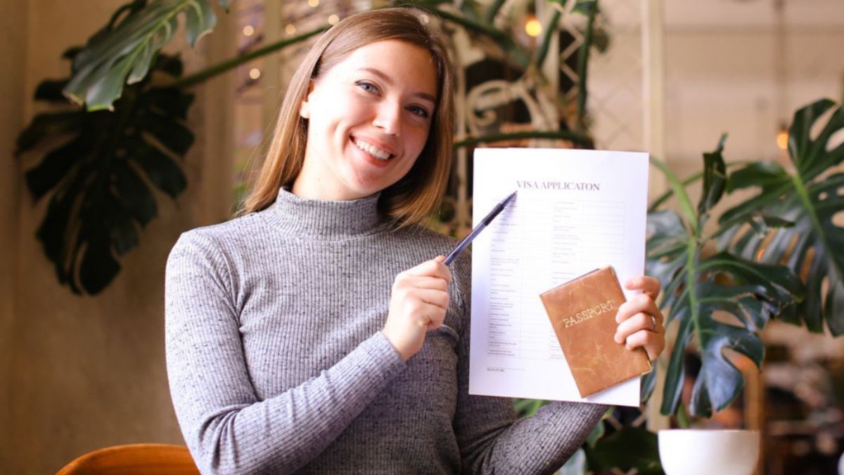 girl holding student visa